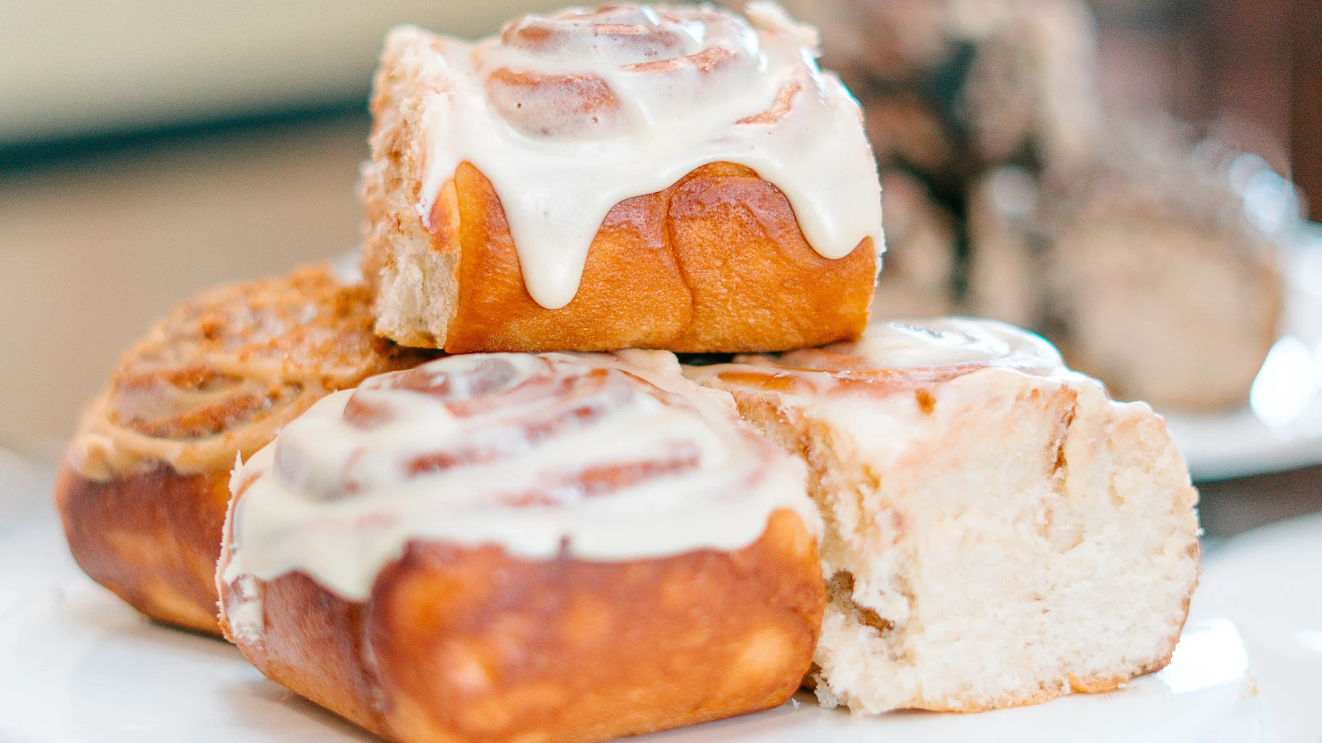 Box of freshly baked blueberry Cimmanon cinnamon rolls